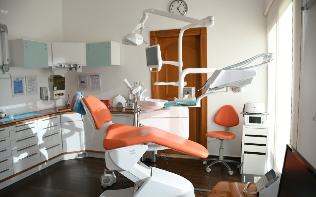 best periodontist in Mylapore reviewing a patient's gum chart